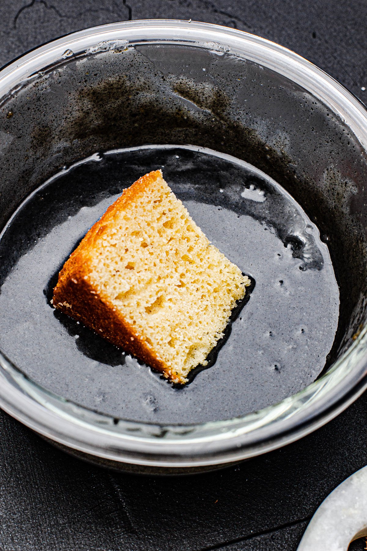 Cake dipped in Black Sesame Sauce