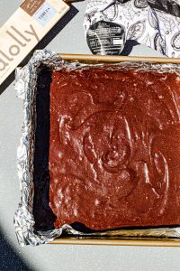 Brownie Batter Just Poured into a Foil Lined Baking Tin