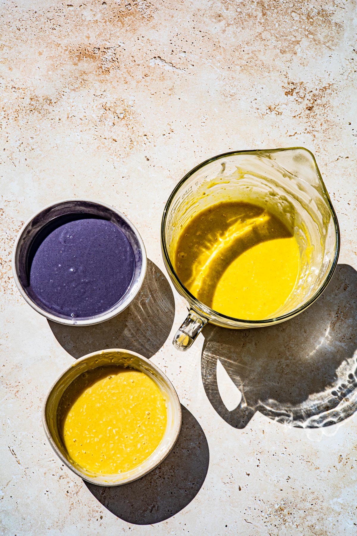 1 bowl of ube cake batter, 1 bowl co coconut cake batter and one bowl of langka cake batter.
