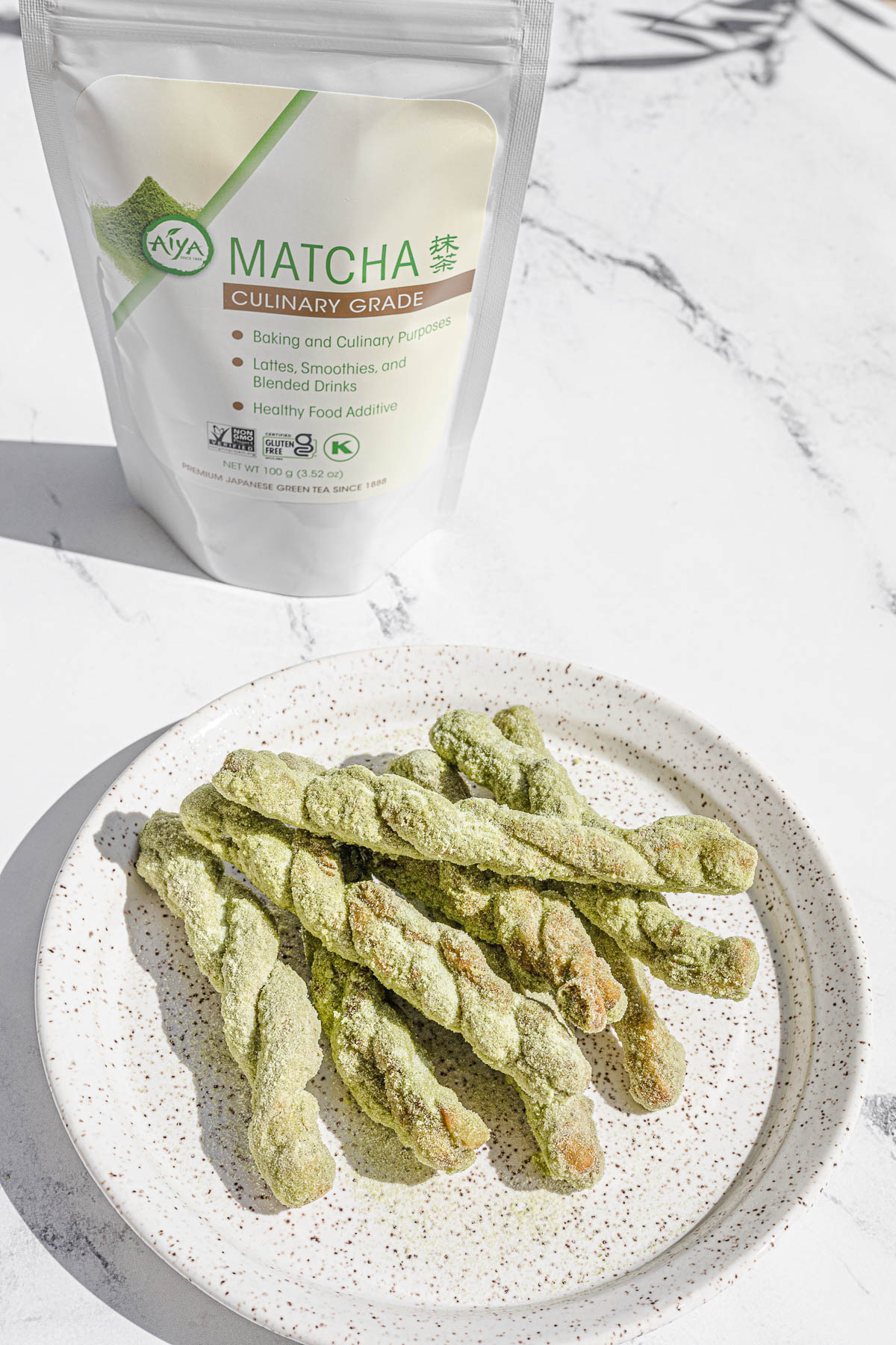 Plate of Pilipit sa Malagkit with Aiya Matcha bag in the background.