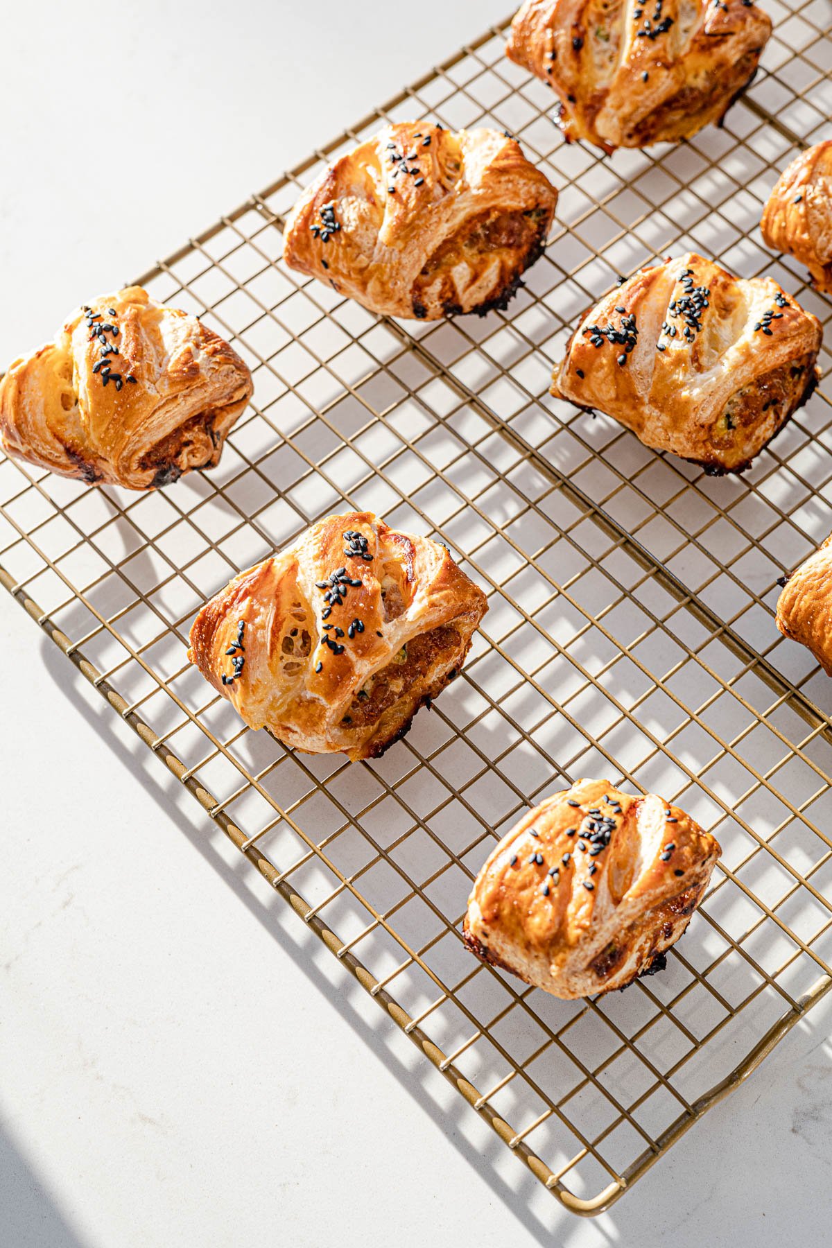 Longanisa Sausage Rolls Cooling down on a wire rack