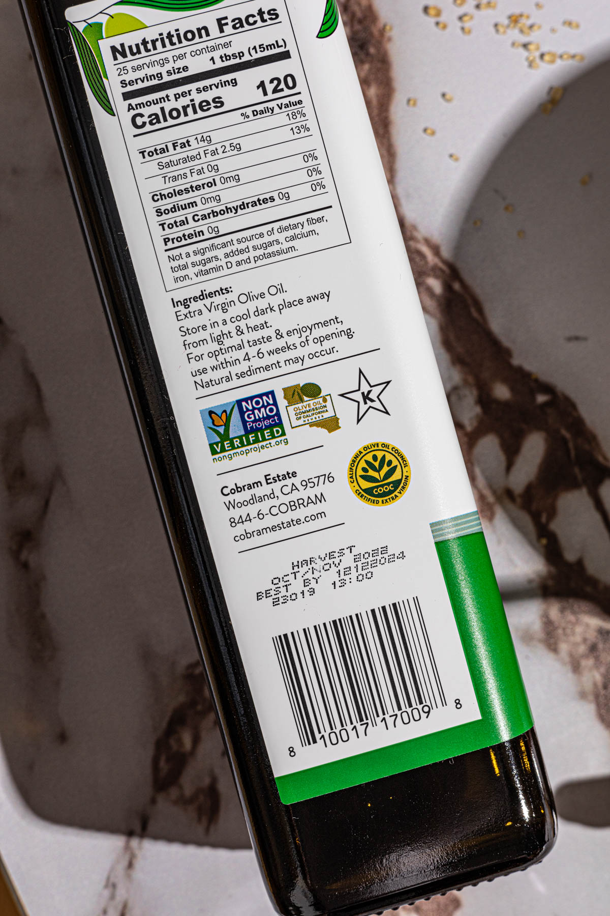 COOC Seal and harvest dates on bottle.