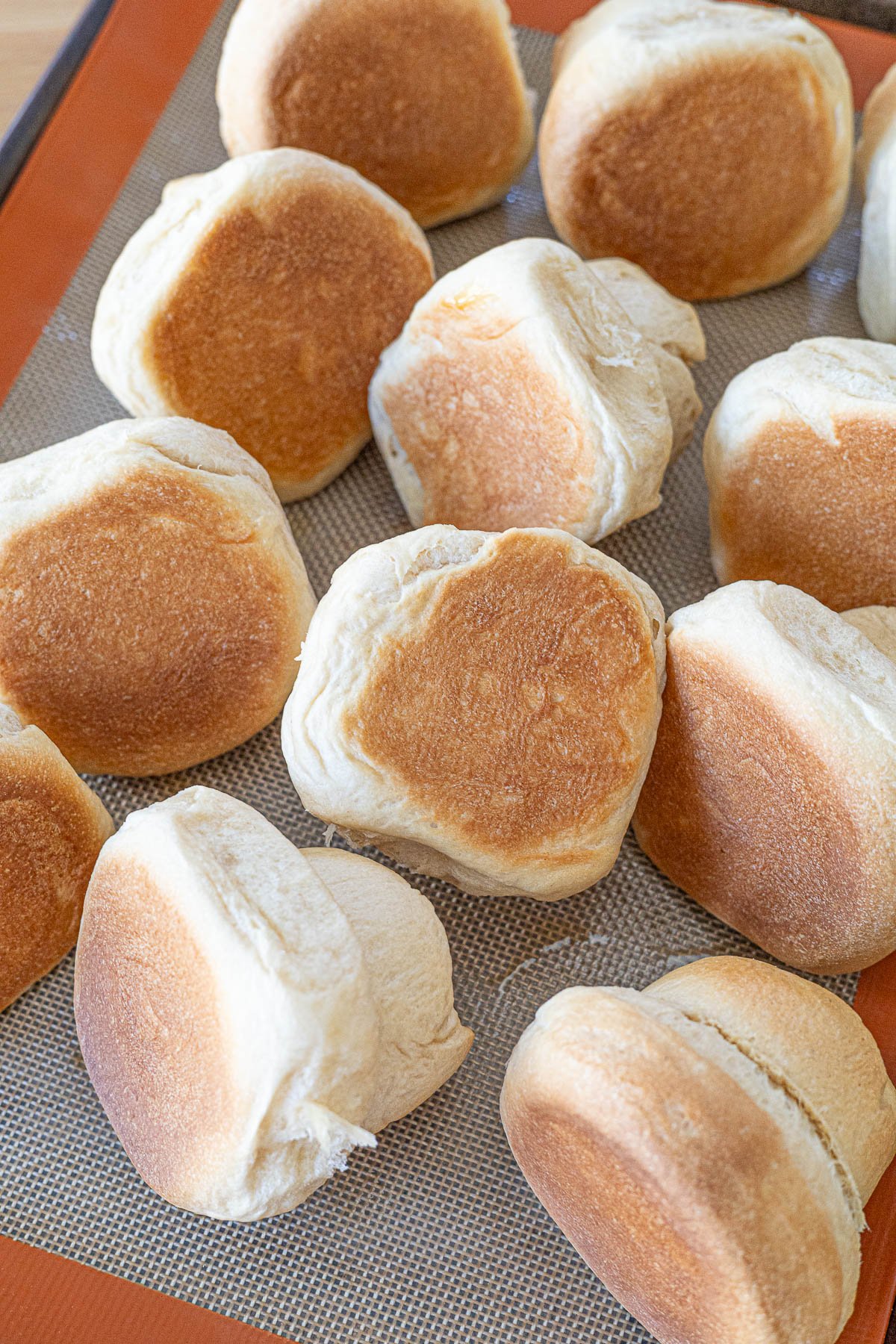12 just baked bonete bread on baking sheet.